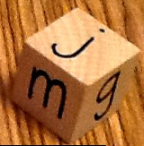 wooden block with letters