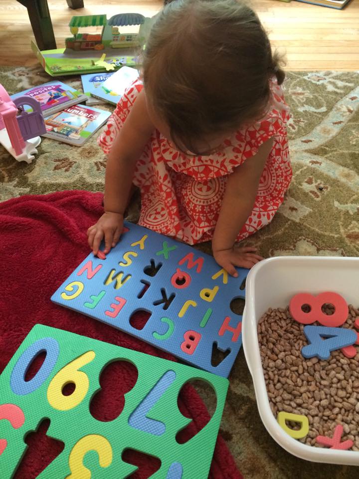 a determined G working on her puzzles